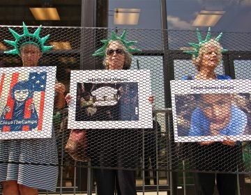 Liberty behind bars was the theme of an Elder Witness protest at the Philadelphia field office for Immigration and Customs Enforcement (ICE). The group objects to policies that separate families and put children in detention. (Emma Lee/WHYY)