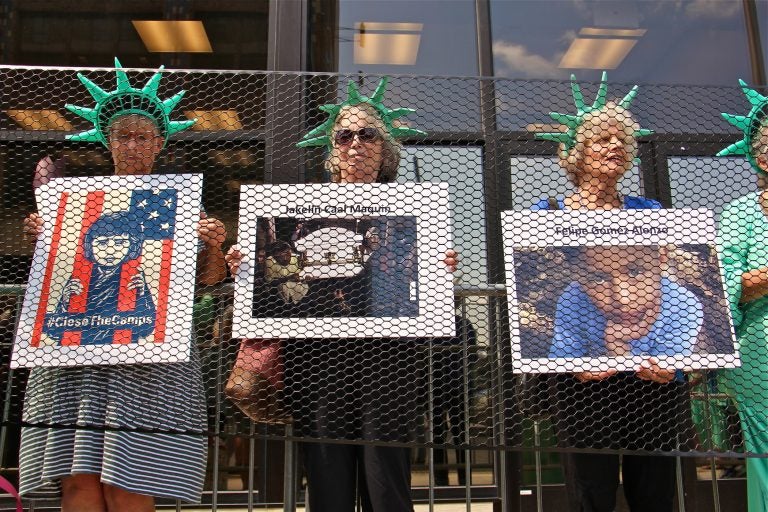 Liberty behind bars was the theme of an Elder Witness protest at the Philadelphia field office for Immigration and Customs Enforcement (ICE). The group objects to policies that separate families and put children in detention. (Emma Lee/WHYY)