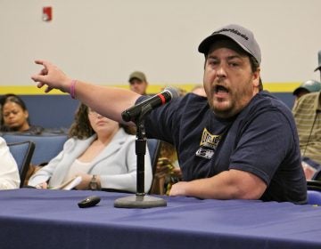 Refinery employee Shawn Tolomeo argues that the Philadelphia Energy Solutions property in South Philadelphia should remain a refinery. (Emma Lee/WHYY)