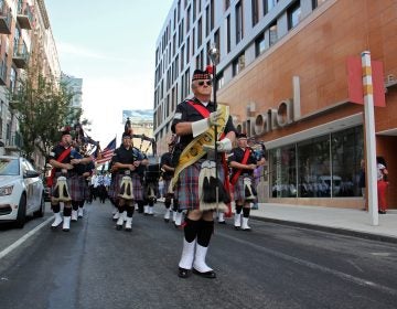 File photo: The Philadelphia Police Pipes and Drums corps marches down Second Street from the Fireman's Hall Museum to the Betsy Ross House, where a 9/11 remembrance ceremony has been held each year since 2002. (Emma Lee/WHYY)