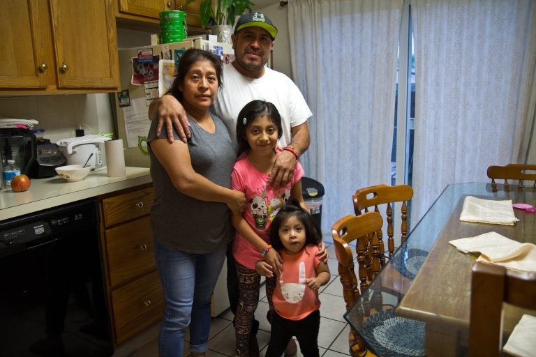 Zenaida Bautista, Jose Cabañas, and their daughters Jannet and Audrey, at their home in Ambler. (Kimberly Paynter/WHYY)