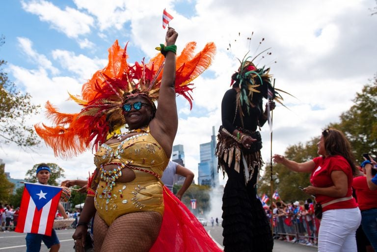 Joya Ellis participates in the 57th annual Puerto Rican Day Parade in Philadelphia. (Kriston Jae Bethel for WHYY)