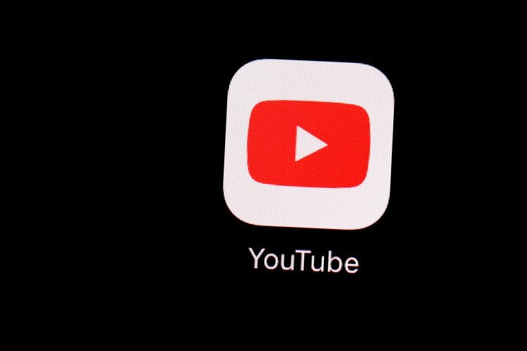 This March 20, 2018, file photo shows the YouTube app on an iPad in Baltimore. Google's video site YouTube has been fined $170 million to settle allegations it collected children's personal data without their parents' consent. (Patrick Semansky/AP Photo)