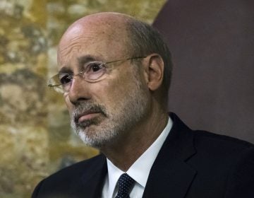 Gov. Tom Wolf listens as Pennsylvania lawmakers come together in an unusual joint session to commemorate the victims of the Pittsburgh synagogue attack that killed 11 people last year at the state Capitol in Harrisburg, Pa. (Matt Rourke/AP Photo)