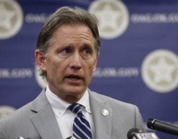 In this Thursday, Sept. 12, 2019 file photo, Oklahoma Attorney General Mike Hunter speaks during a news conference in Oklahoma City. Consumer products giant Johnson & Johnson is appealing an Oklahoma judge's $572 million order against the company and its subsidiaries for helping fuel the state's opioid crisis. (Sue Ogrocki/AP Photo, File)