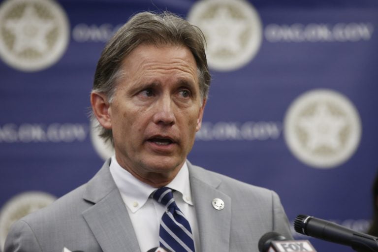 In this Thursday, Sept. 12, 2019 file photo, Oklahoma Attorney General Mike Hunter speaks during a news conference in Oklahoma City. Consumer products giant Johnson & Johnson is appealing an Oklahoma judge's $572 million order against the company and its subsidiaries for helping fuel the state's opioid crisis. (Sue Ogrocki/AP Photo, File)