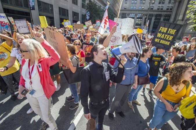 Protesters stopped on the east side of City Hall to chant for elected officials inside the building. (Jonathan Wilson for WHYY)