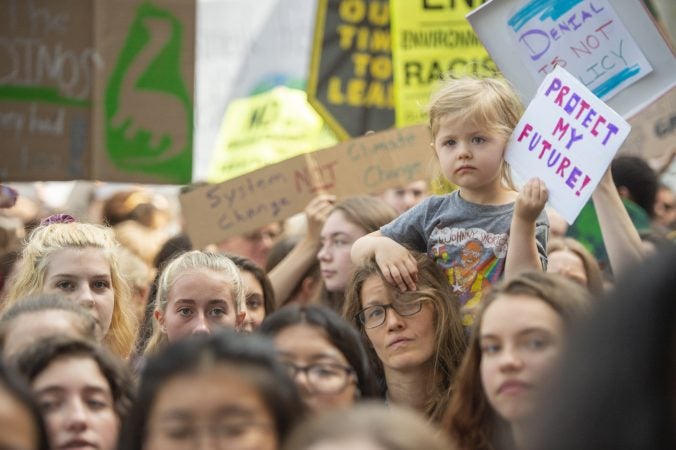 A number of parents brought their young children to the climate strike. (Jonathan Wilson for WHYY)