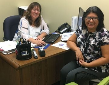 Ivanka Carbajal (left) and Maria Merma work as family navigators at Autism Delaware, helping connect Spanish speaking families to the services they need. (Mark Eichmann/WHYY)