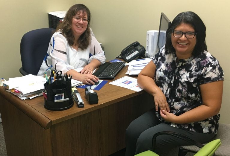 Ivanka Carbajal (left) and Maria Merma work as family navigators at Autism Delaware, helping connect Spanish speaking families to the services they need. (Mark Eichmann/WHYY)