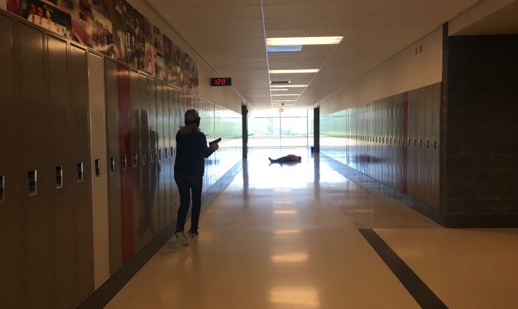 Ohio teachers participate in a school shooting simulation run by FASTER. (Jen Kinney for Keystone Crossroads)