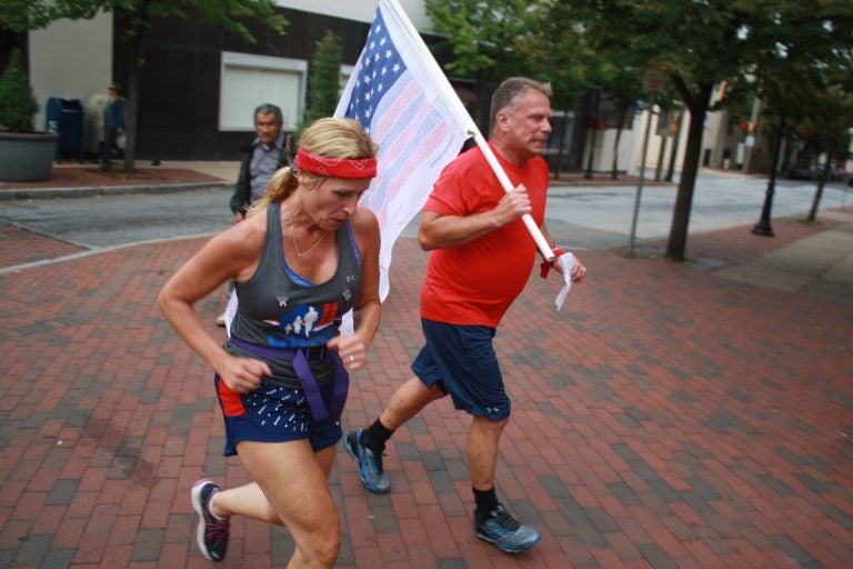 Runners head through downtown Wilmington on their way from the Pentagon to Ground Zero in New York City as part of the 243-mile 9/11 Promise Run. (Mark Eichmann/WHYY)