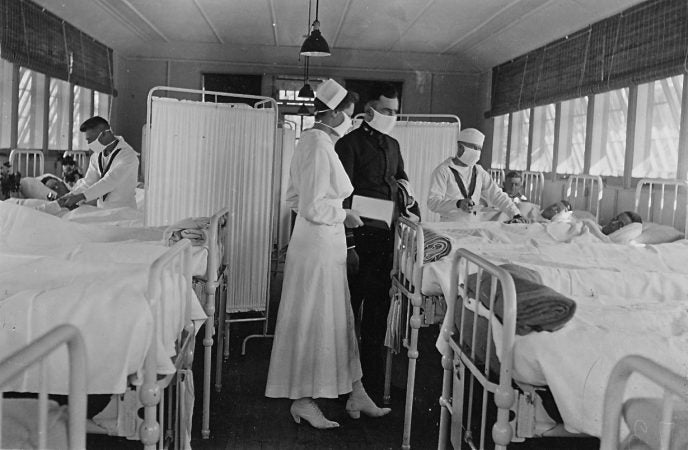 Sailors are treated in the isolation ward of the Naval hospital in Gulfport, Mississippi during the influenza epidemic, 1918/19. At least 25 million people in the United States were infected (one quarter of the population) and more than 700,000 people died in the United States alone.
(NH 116532 courtesy of the Naval History & Heritage Command)