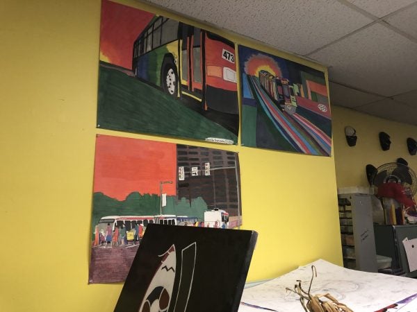 Art made by members adorns the walls of the Creative Vision Factory. (Cris Barrish/WHYY)