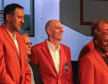 Retired Sixer Bobby Jones (center) at the jacket ceremony for his Hall of Fame induction CAM SMITH / FOR BILLY PENN