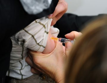 A child is immunized against measles, mumps and rubella in Lyon, France. (BSIP/Universal Images Group via Getty)