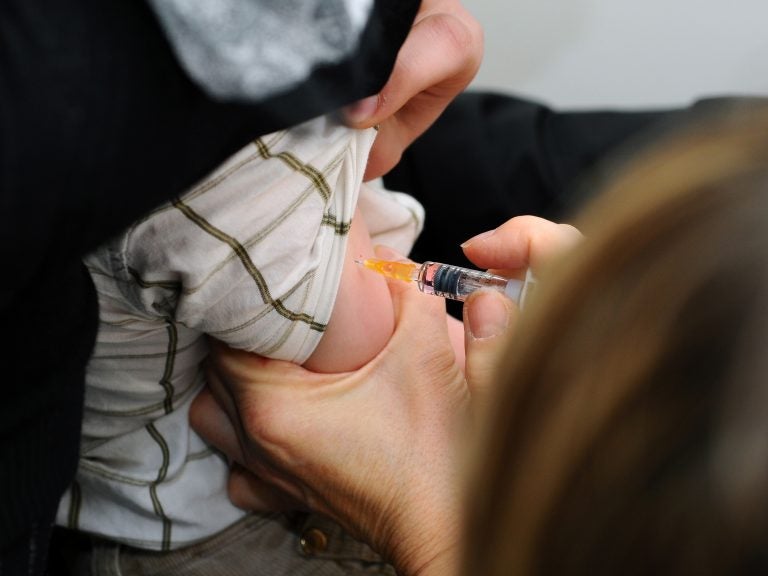 A child is immunized against measles, mumps and rubella in Lyon, France. (BSIP/Universal Images Group via Getty)