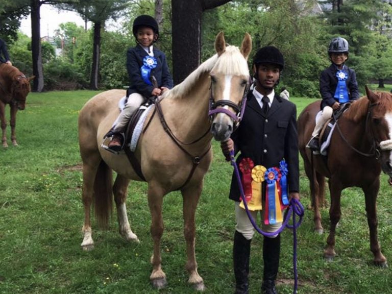 Schyler Smith, (far left), Marc Harris and Shane Woodson are some of the younger members of Work to Ride in Philadelphia's Fairmount Park. (Courtesy of Lezlie Hiner)