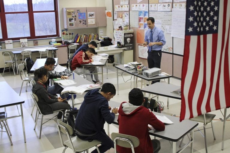 FILE PHOTO: In this Feb. 15, 2017, photo, Eric Hoover teaches his class of immigrant and refugee students at McCaskey High School in Lancaster, Pa. (Michael Rubinkam/AP Photo)