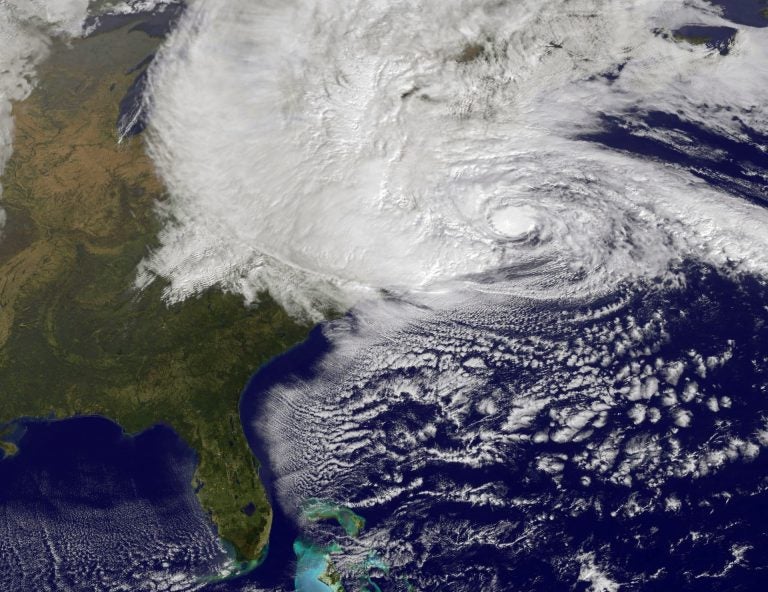 Scientists have been studying the link between climate change and extreme weather events such as Hurricane Sandy, shown here in a NASA image, which left more than 1.3 million Pennsylvanians in the dark in 2012. (Getty Images)