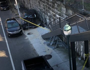 A chevy smashed into the Rail Park steps on Tuesday after the driver had a seizure. COURTESY JOHN PETTIT
