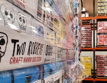 Stacks of Two Robbers hard seltzer in the Yards Brewing walk-in (Mark Henninger/for Billy Penn)