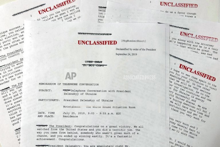 In this Sept. 25, 2019, file photo, a White House-released memorandum of President Donald Trump's July 25, 2019, telephone conversation with Ukraine's newly elected president Volodymyr Zelenskiy, released Sept. 25, 2019. (Wayne Partlow/AP Photo)