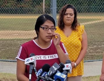 Noema Alavez Perez wipes away a tear as she talks to reporters about her missing daughter. Five-year-old Dulce Maria Alavez disappeared from Bridgeton City Park on Sept. 16. (Nicholas Pugliese/WHYY)