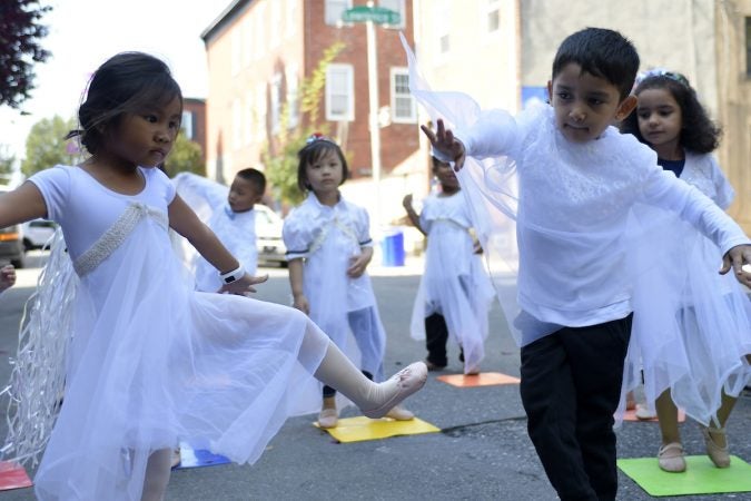 Students of the Settlement Music School perform at the unveiling of a historical marker for the Mother Bethel AME Burying Ground. (Bastiaan Slabbers for WHYY)