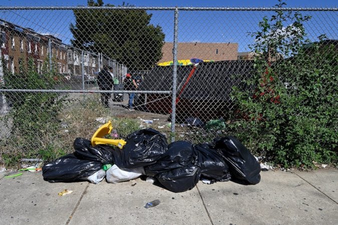 Human feces, trash and drug-related items are found outside the Lewis Elkin Elementary School campus. (Bastiaan Slabbers for WHYY)