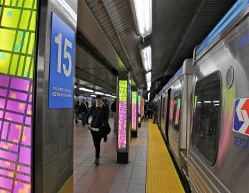 Ray King's artwork illuminates the platform of the revamped 15th Street Station. (Emma Lee/WHYY)