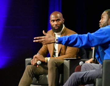 Malcolm Jenkins and Meek Mill at the Players Coalition Town Hall on Policing in the city, at Community College of Philadelphia, on Monday. (Bastiaan Slabbers for WHYY)