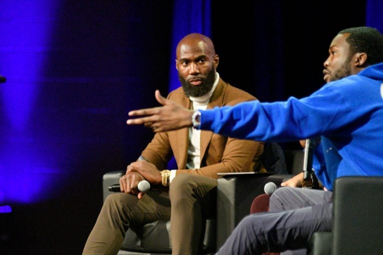 Malcolm Jenkins and Meek Mill at the Players Coalition Town Hall on Policing in the city, at Community College of Philadelphia, on Monday. (Bastiaan Slabbers for WHYY)