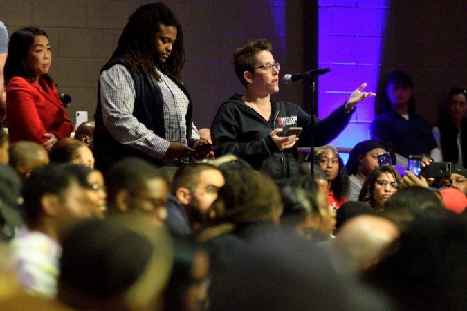 Audience members field questions for panelist on stage during the Players Coalition Town Hall on Policing in the city, at Community College of Philadelphia, on Monday. (Bastiaan Slabbers for WHYY)