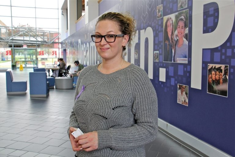 After going through addiction treatment, Felisha Buzard is a student at Camden County College and looks forward to regaining custody of her 2-year-old daughter. (Emma Lee/WHYY)