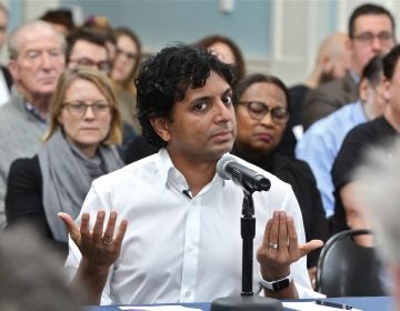 Filmmaker M. Night Shyamalan testifies in support of film tax credits during a hearing before the Pennsylvania House Democratic Policy Committee, held at the Museum of the American Revolution in Philadelphia. (Emma Lee/WHYY)