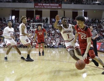 Rutgers guard Caleb McConnell (22) goes to the basket against Indiana guard Aljami Durham (1) during the first half of an NCAA college basketball game, Sunday, March 10, 2019, in Bloomington, Ind. (Darron Cummings/AP Photo)