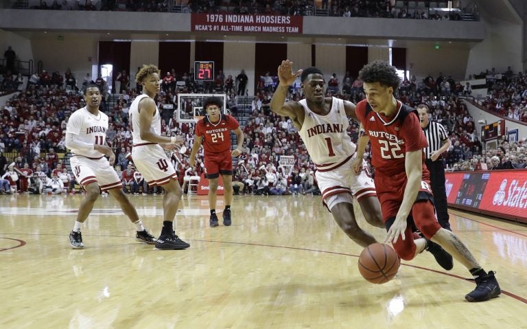 Rutgers guard Caleb McConnell (22) goes to the basket against Indiana guard Aljami Durham (1) during the first half of an NCAA college basketball game, Sunday, March 10, 2019, in Bloomington, Ind. (Darron Cummings/AP Photo)