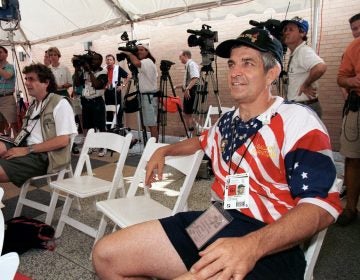 FILE - In this July 25, 1996 file photo, Jim 'Mattress Mack' McIngvale listens during a press conference at the the Atlanta Chamber of Commerce building in Atlanta. Jim McIngvale, a mattress store owner from Houston who calls himself 'Mattress Mack,' plans to bet at least $1.5 million on the Astros in New Jersey on Thursday, Oct. 3, 2019. (Richard Carson/Houston Chronicle via AP)