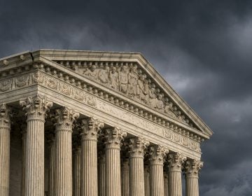 In this June 20, 2019 file photo, The Supreme Court is seen under stormy skies in Washington.  The Supreme Court is adding an abortion case to its busy election-year docket. The justices have agreed to take up a Louisiana law that could leave the state with just one clinic. (J. Scott Applewhite/AP Photo)