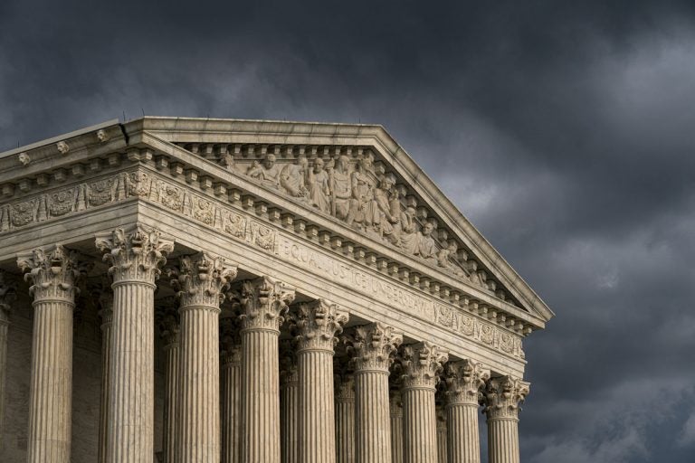 In this June 20, 2019 file photo, The Supreme Court is seen under stormy skies in Washington.  The Supreme Court is adding an abortion case to its busy election-year docket. The justices have agreed to take up a Louisiana law that could leave the state with just one clinic. (J. Scott Applewhite/AP Photo)