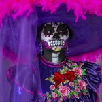 Rosa E. Ruiz wears an elaborate costume during a celebration of the Mexican tradition, Day of the Dead, at the Penn Museum in Philadelphia. (Miguel Martinez for WHYY)