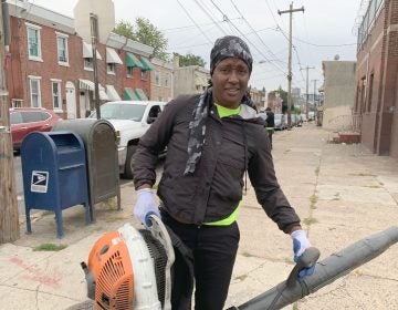 Streets Department employee Shaketa Armstead worries about her health every day she's on the job, in part because the low-quality safety equipment the city provides. (Aaron Moselle/WHYY)

