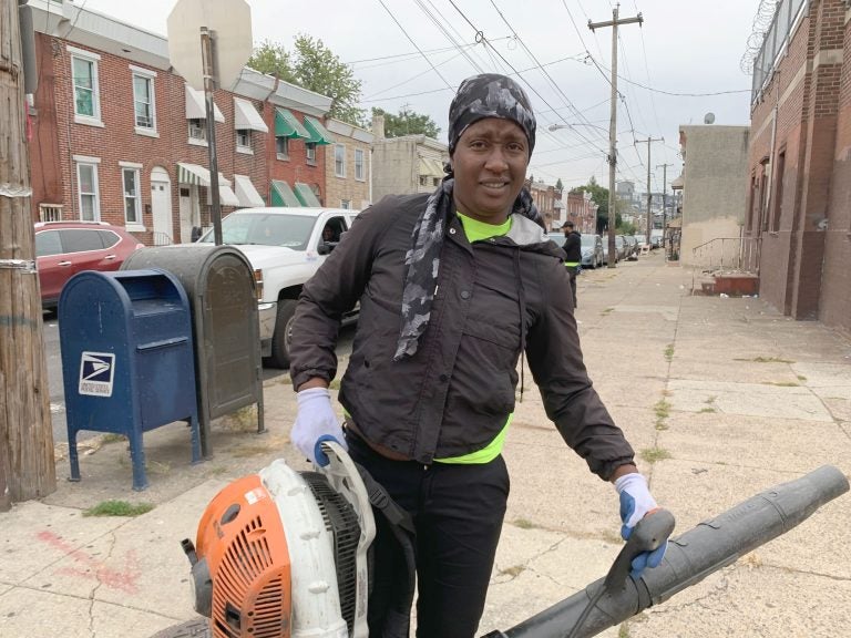 Streets Department employee Shaketa Armstead worries about her health every day she's on the job, in part because the low-quality safety equipment the city provides. (Aaron Moselle/WHYY)

