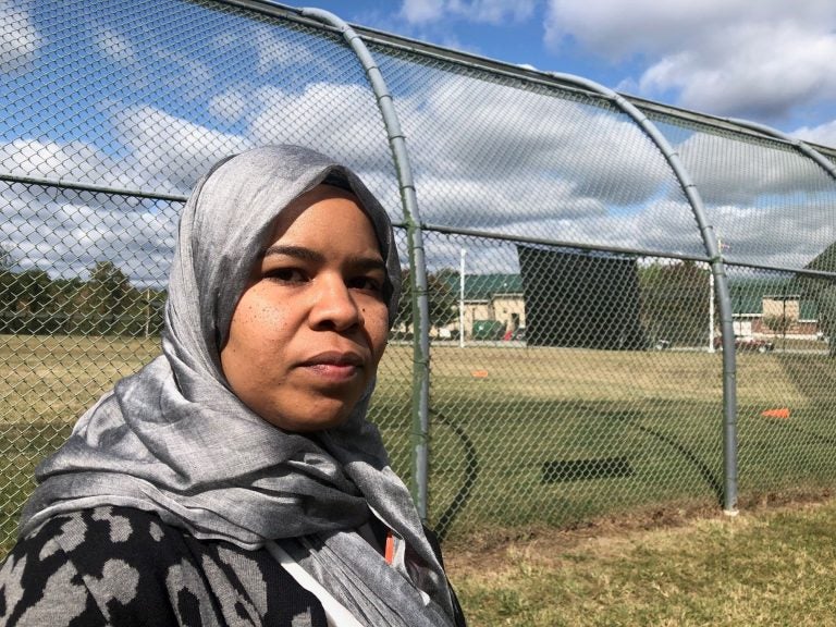 Madinah Brown has filed federal and state discrimination complaints for the right to wear her hijab to work. The detention center policy says attire should not “pose unnecessary safety risks.” (Cris Barrish/WHYY)