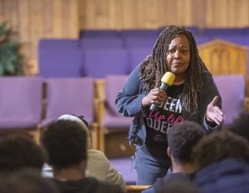 Guardian Civic League President and Democratic nominee for Philadelphia Sheriff Rochelle Bilal explains to a  young audience best practices for encounters with police officers when they are stopped for questioning. (Jonathan Wilson for WHYY)