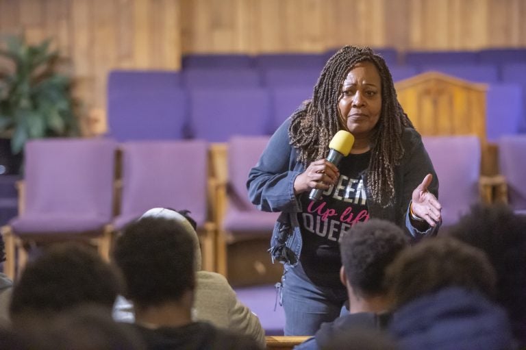 Guardian Civic League President and Democratic nominee for Philadelphia Sheriff Rochelle Bilal explains to a  young audience best practices for encounters with police officers when they are stopped for questioning. (Jonathan Wilson for WHYY)