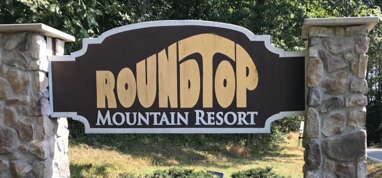 A sign for Roundtop Mountain Resort is posted along the road in Lewsiberry, York County, Oct. 1, 2019. (Brett Sholtis/WITF)