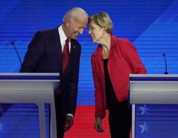 Democratic presidential candidates Joe Biden and Sen. Elizabeth Warren, D-Mass., connect before the September Democratic presidential primary debate. (David J. Phillip/AP Photo)