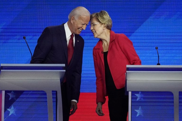 Democratic presidential candidates Joe Biden and Sen. Elizabeth Warren, D-Mass., connect before the September Democratic presidential primary debate. (David J. Phillip/AP Photo)